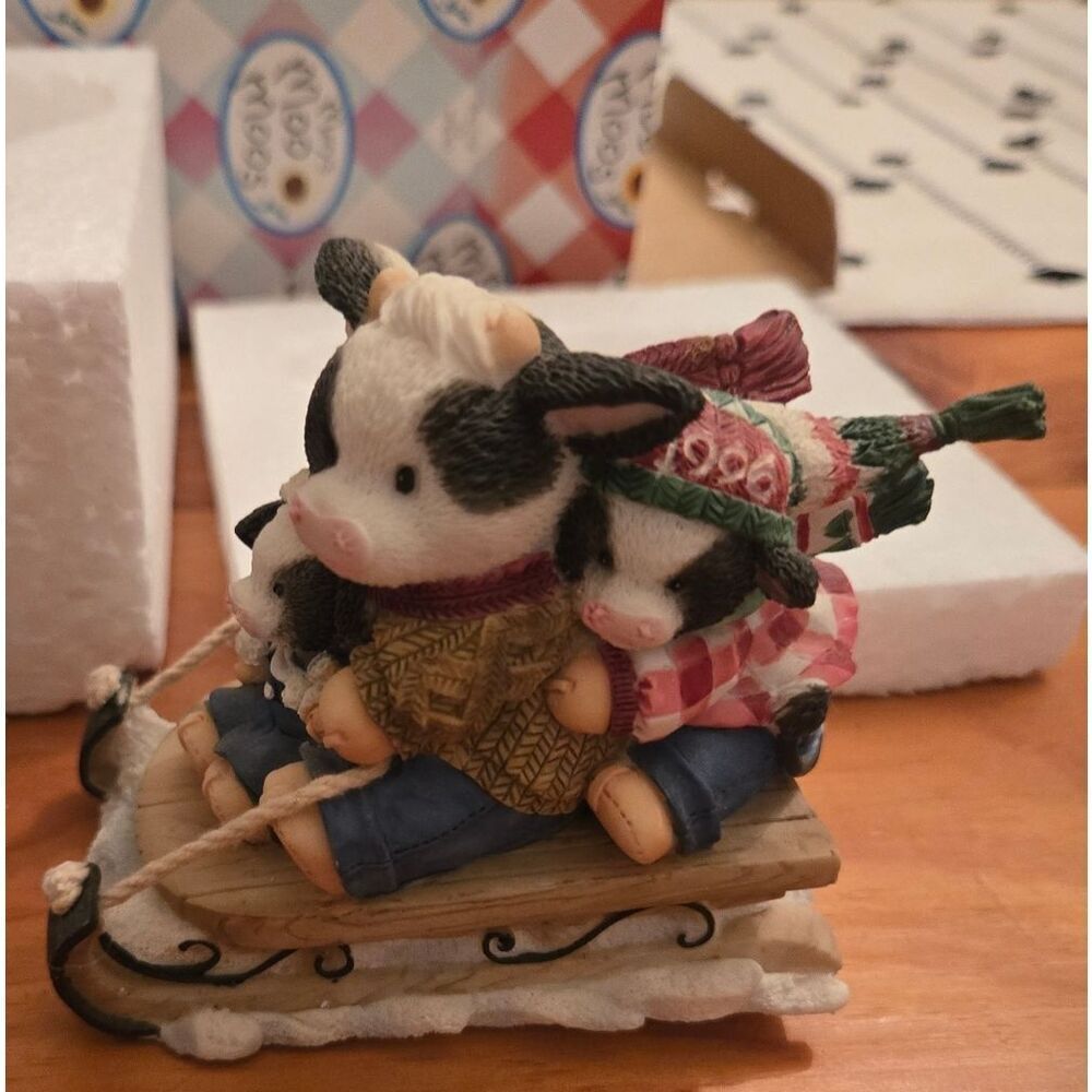 Mary's Moo Moos Family on Sled Figurine